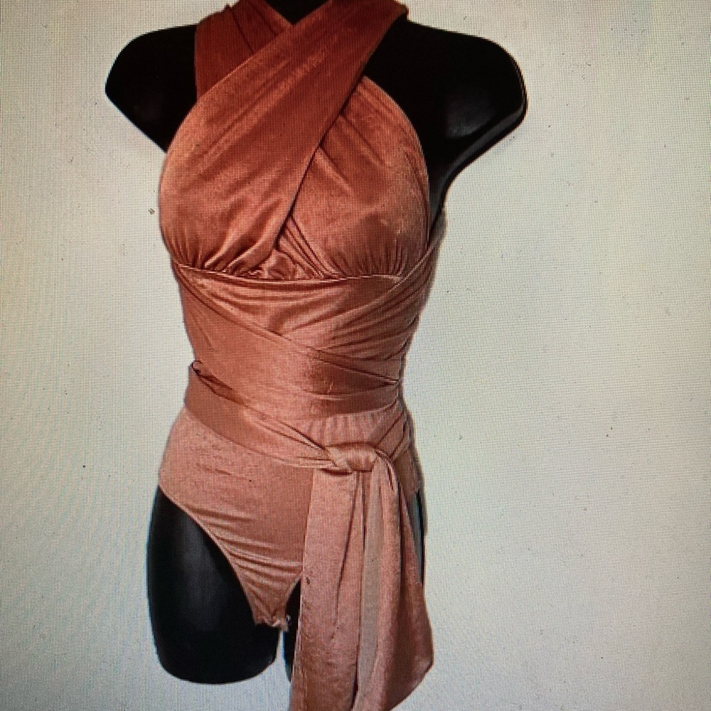 Free People multi ways body suit. Convertible.